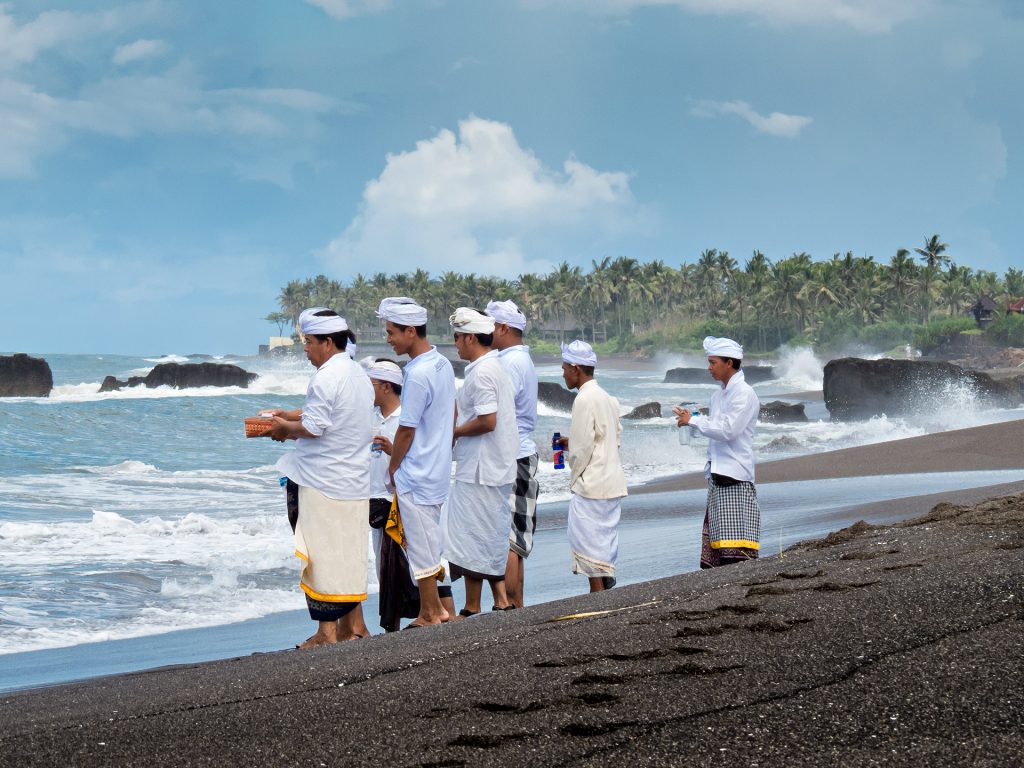 Melasti ceremony in the sea