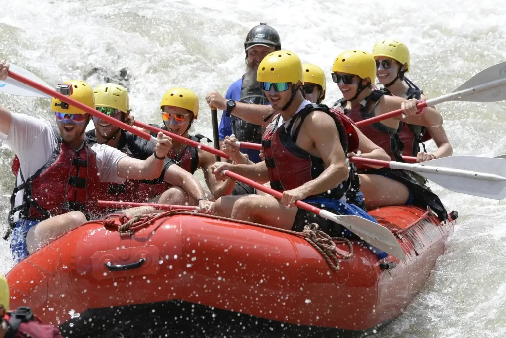 a group of people doing water rafting ubud